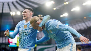 <p>PERFECT PAIR: Manchester City's Erling Haaland (right) celebrates scoring their side's third goal of the game with team-mate Phil Foden. Pic: Mike Egerton, PA Wire.</p>