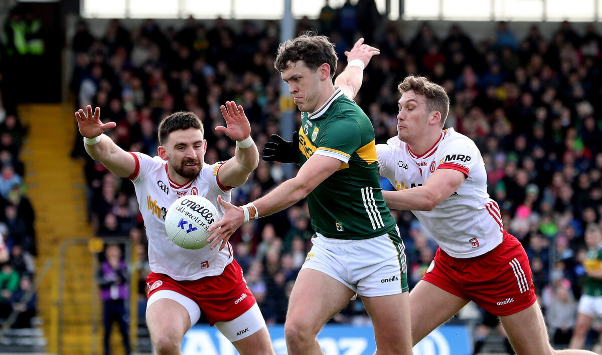 Tyrone’s Padraig Hampsey and Ben Cullen tackle David Clifford of Kerry. Pic: Bryan Keane, Inpho