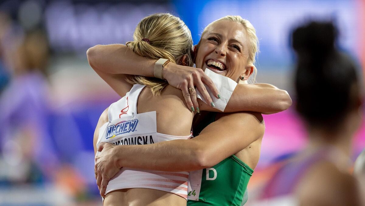 Ireland’s Sarah Lavin celebrates with Pia Skrzyszowska of Poland. Picture: ©INPHO/Morgan Treacy