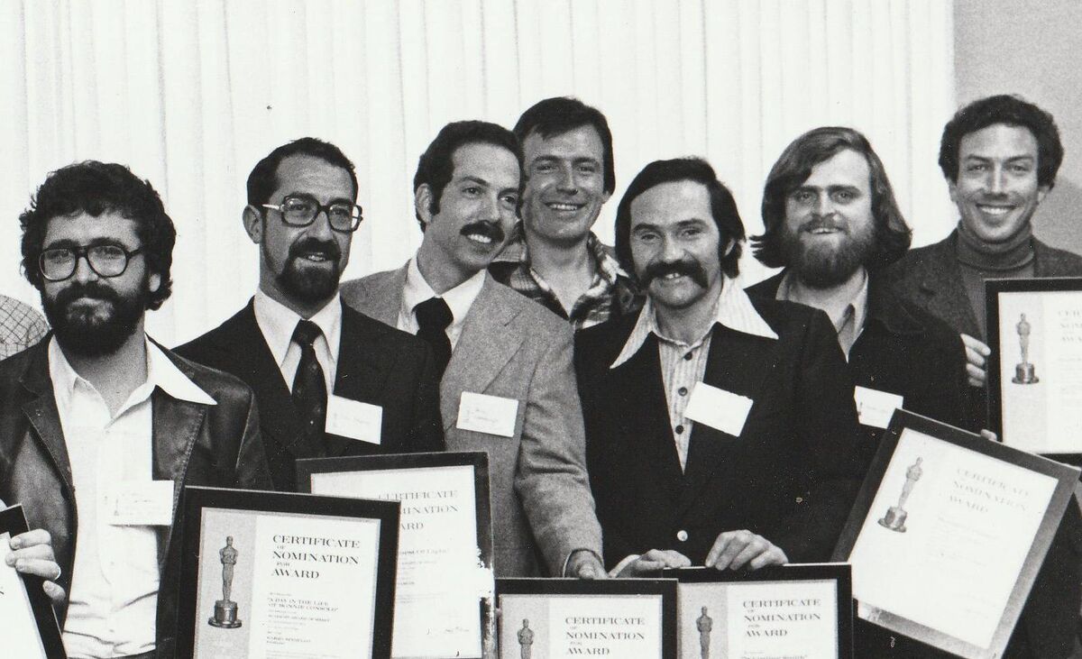 Oscar nominees in the short film category receive their certificate of nomination plaques at the 1976 Academy Awards, with Louis Marcus second from left. 