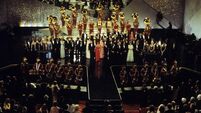 ELIZABETH TAYLOR (C) AND THE USC TROJAN MARCHING BAND WITH OSCAR WINNERS AND PRESENTERS