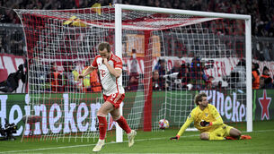 <p>GUARANTEED GOALS: Bayern's Harry Kane celebrates after scoring his side's third goal during the Champions League round of 16 second leg. Pic: Sven Hoppe, DPA via AP.</p>