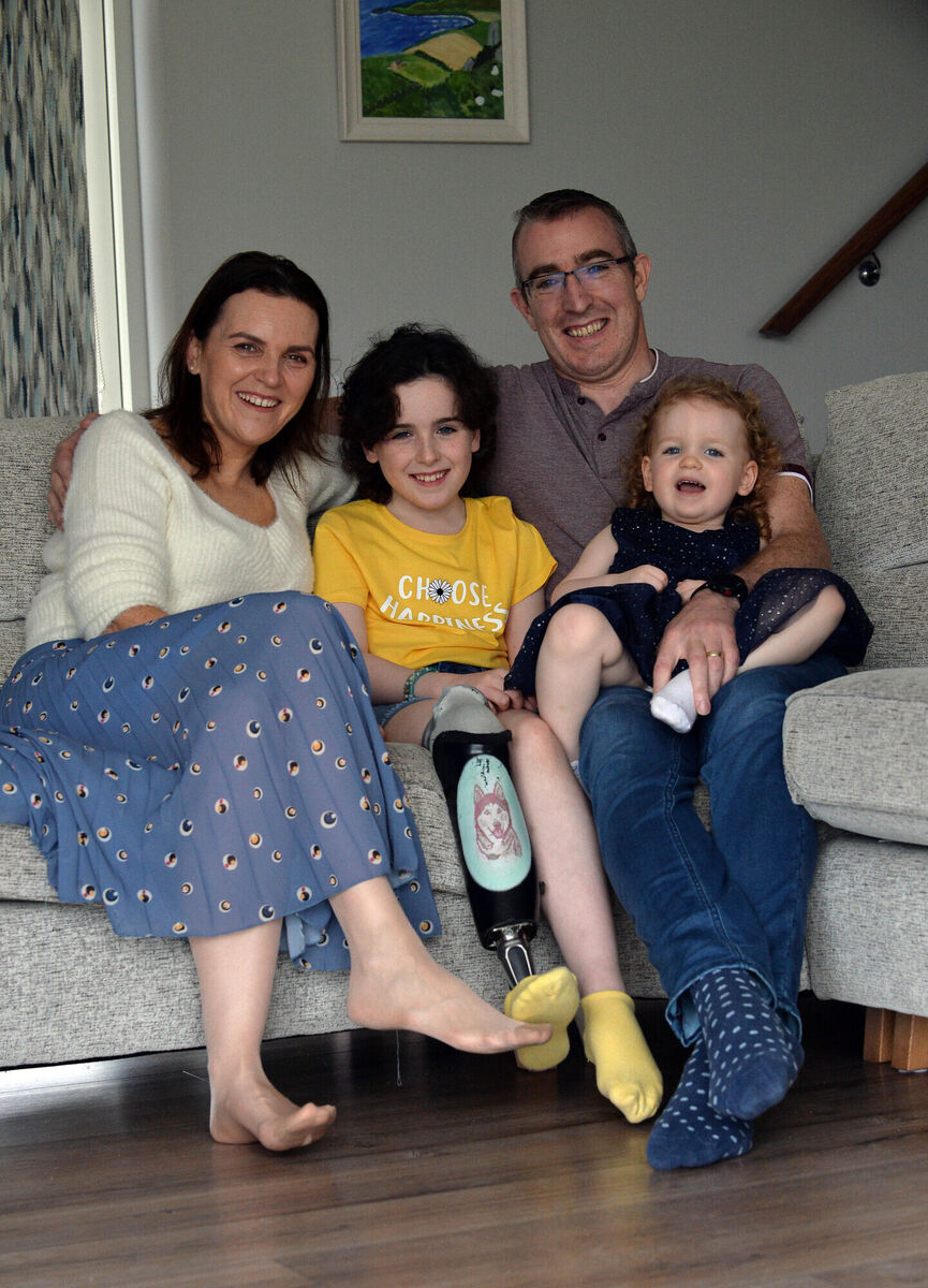 Roseanna and Ollie Ruane with their children Saoirse and Farrah Rose at their home. Picture: Ray Ryan