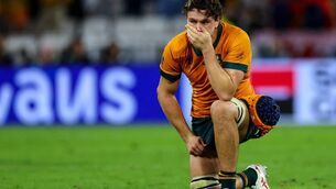 <p>CRESTFALLEN: Australia's Tom Hooper after the Wallabies were knocked out of the 2023 World Cup.</p>
