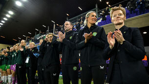 <p>Ireland assistant coaches Colin Healy and Emma Byrne with head coach Eileen Gleeson. Pic: INPHO/Giuseppe Fama</p>