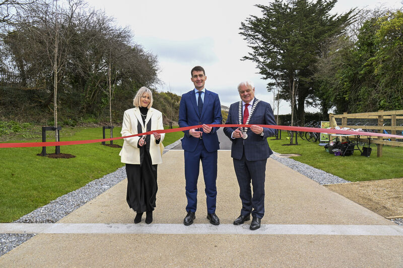 From left: Cork County Council chief executive Valerie O'Sullivan; Minister Jack Chambers and Cllr Frank O'Flynn, Mayor of the County of Cork, cutting the ribbon on the new 8km ection of the greenway. Picture: Brian Lougheed From left: Cork County Council chief executive Valerie O'Sullivan; Minister Jack Chambers and Cllr Frank O'Flynn, Mayor of the County of Cork, cutting the ribbon on the new 8km ection of the greenway. Picture: Brian Lougheed