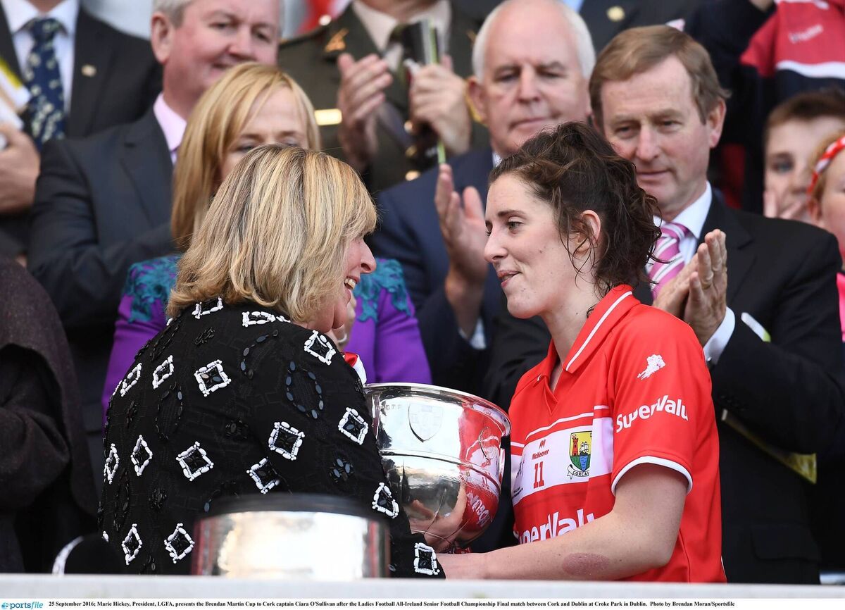 LEGEND: Marie Hickey, President, LGFA, presents the Brendan Martin Cup to Cork captain Ciara O'Sullivan after the 2016 Ladies Football All-Ireland Senior Football Championship final. Picture: Brendan Moran/Sportsfile 