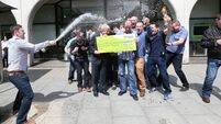 Cork work syndicate picks up €500,000 EuroMillions cheque