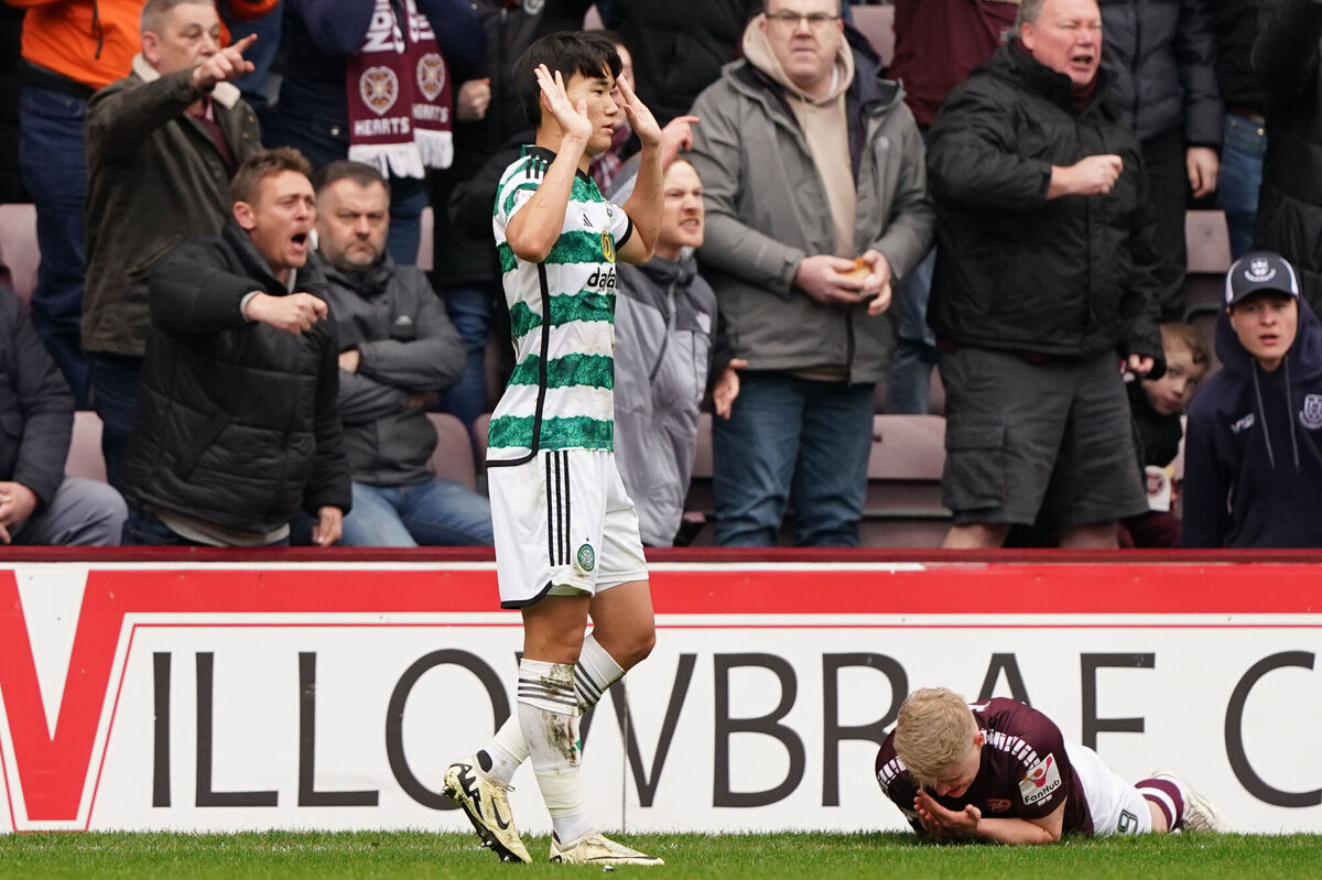 Celtic’s Yang Hyun-Jun (left) reacts after fouling Hearts' Alex Cochrane. Picture: Andrew Milligan/PA Wire.