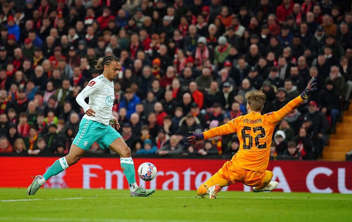 Liverpool goalkeeper Caoimhin Kelleher saves from Southampton's Sekou Mara during the Emirates FA Cup fifth round. Photo credit: Peter Byrne/PA Wire.