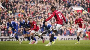 <p>Marcus Rashford scores from the spot.</p>