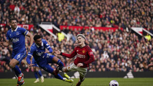<p>Manchester United's Alejandro Garnacho, right is fouled by Everton's Ben Godfrey, centre, who gave a way a penalty to Manchester United during an English Premier League soccer match between Manchester United and Everton at the Old Trafford stadium in Manchester, England, Saturday, March 9, 2024. (AP Photo/Dave Thompson)</p>