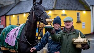 <p>Boodles Cheltenham Gold Cup Winner Galopin Des Champs at Leighlinbridge, Carlow with trainer Willie Mullins and groom Adam Connolly. Pic: INPHO/Morgan Treacy</p>