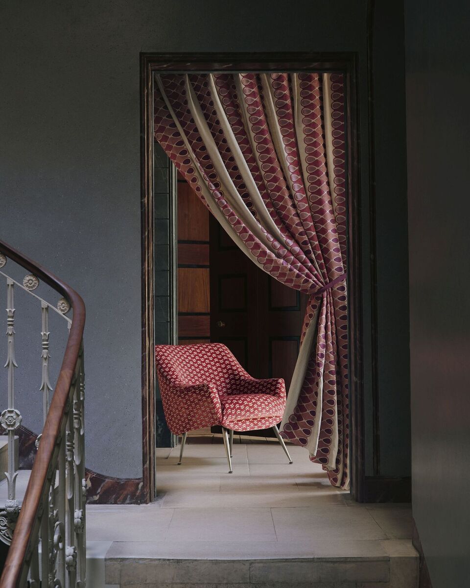  For a luxurious touch in a drawing room, Niki Rose Ancien by Manuel Canovas features textured embroidery on a linen background.