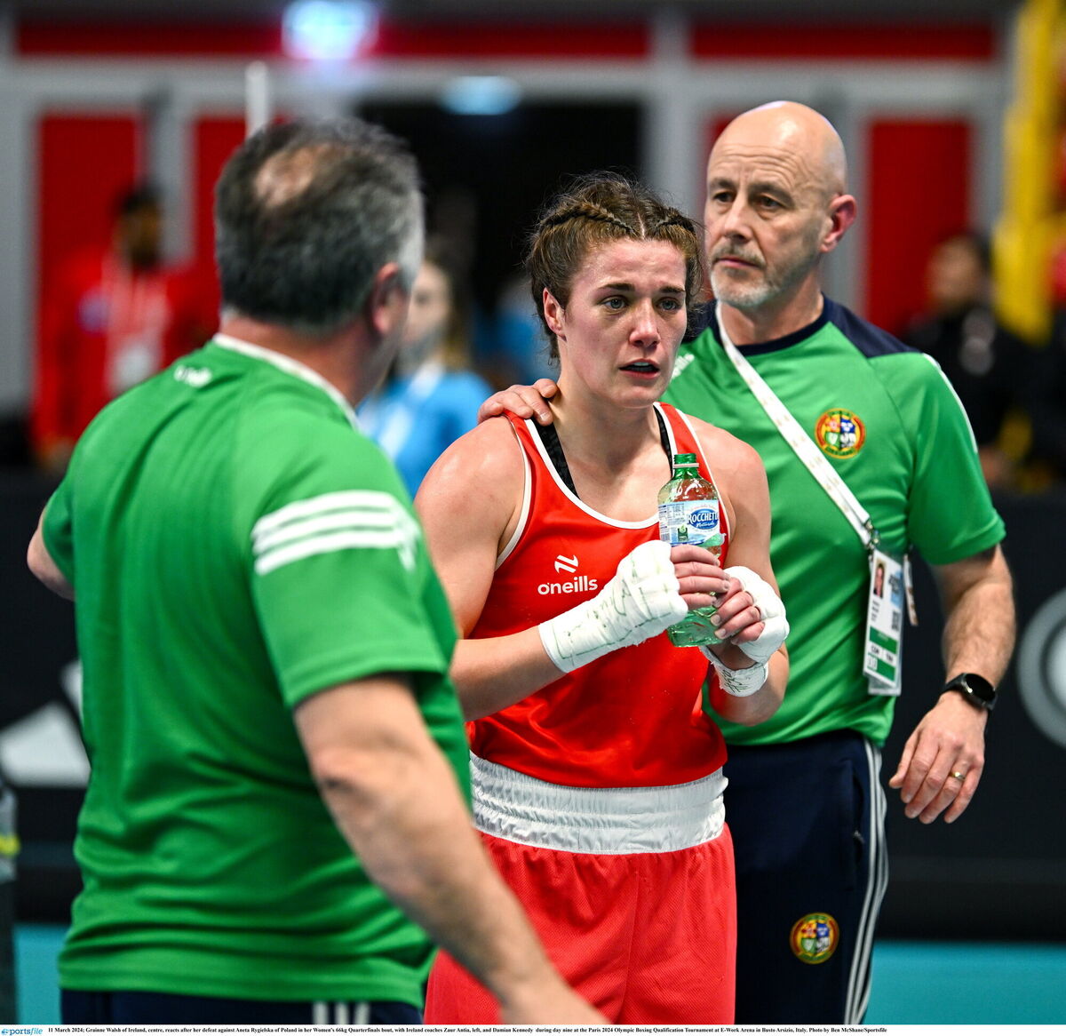 Gráinne Walsh of Ireland, centre, reacts after her with Ireland coaches Zaur Antia, left, and Damian Kennedy. Picture: Ben McShane/Sportsfile Gráinne Walsh of Ireland, centre, reacts after her with Ireland coaches Zaur Antia, left, and Damian Kennedy. Picture: Ben McShane/Sportsfile
