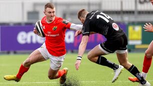 <p>FLYER: Munster A's Jonathan Wren is tackled by Aaron Sexton of Ulster A. Picture: ©INPHO/Bryan Keane</p>