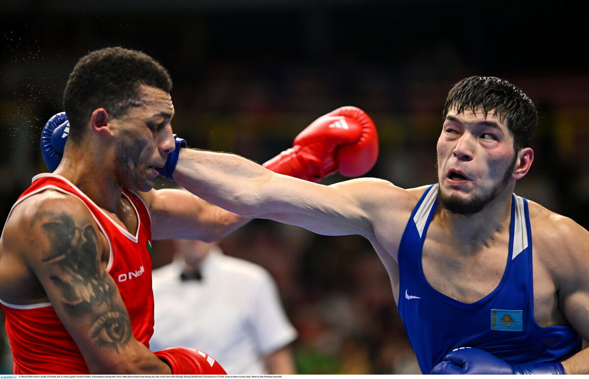 Kelyn Cassidy of Ireland, left, in action against Nurbek Oralbay of Kazakhstan. Picture: Ben McShane/Sportsfile