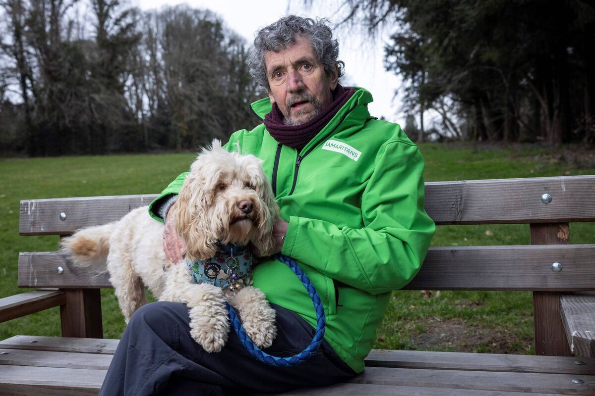 Charlie Bird with his dog, Tiger ahead of a special Hand of Friendship Walk for Samaritans.