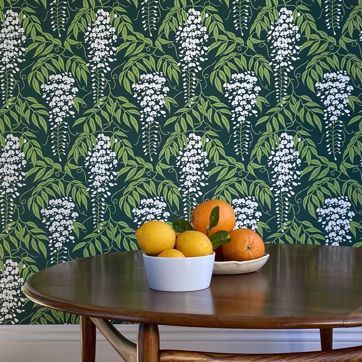 Look for vertically inclined papers and stencil patterns to 'lift' low ceilings. The luxury wallpaper Wisteria (shown in Pine) is €134 per roll, Fiona Howard. Look for vertically inclined papers and stencil patterns to 'lift' low ceilings. The luxury wallpaper Wisteria (shown in Pine) is €134 per roll, Fiona Howard.Â