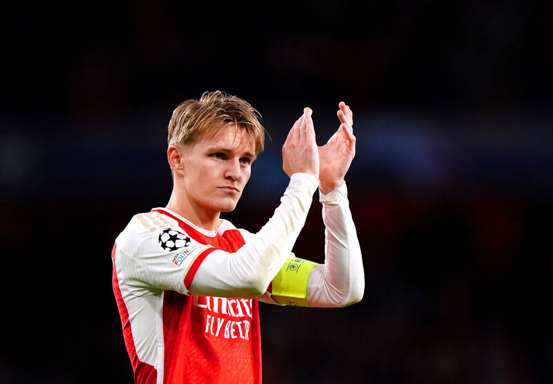 Arsenal's Martin Odegaard applauds the fans at the end of the UEFA Champions League Round of 16, second leg match at the Emirates Stadium, London. Picture: Zac Goodwin/PA Wire. 