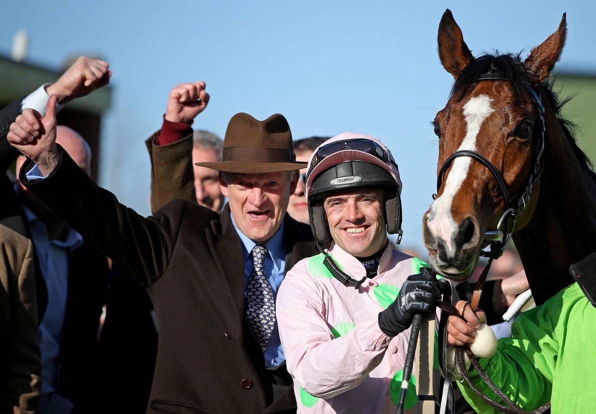 2015 Cheltenham Festival: Ruby Walsh and Faugheen celebrate with winning trainer Willie Mullins. PIcture: ©INPHO/Dan Sheridan