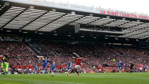 <p>Fans are being moved from the Sir Bobby Charlton stand at Old Trafford. Pic: Martin Rickett/PA</p>