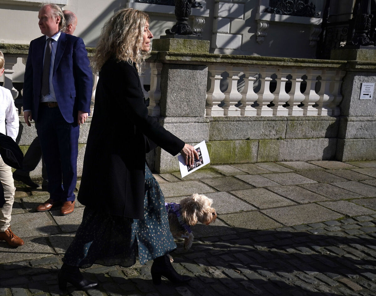 Charlie Bird's wife Claire with his dog Tiger. Picture: Brian Lawless/PA