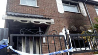 Man, woman and child fight for lives after Belfast fire