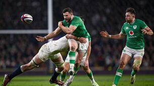 <p>CRUNCH: Robbie Henshaw get the pass away under pressure from England's Ollie Chessum in the dramatic Six Nations clash at Twickenham Stadium. Pic: Harry Murphy/Sportsfile </p>