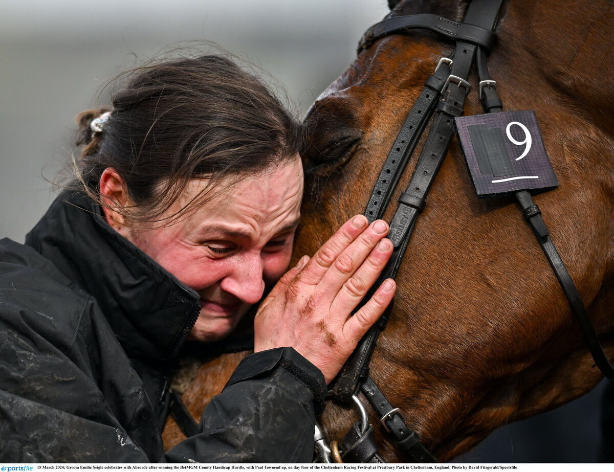 Groom Emilie Seigle celebrates with Absurde after winning the County Handicap Hurdle. Photo by David Fitzgerald/Sportsfile