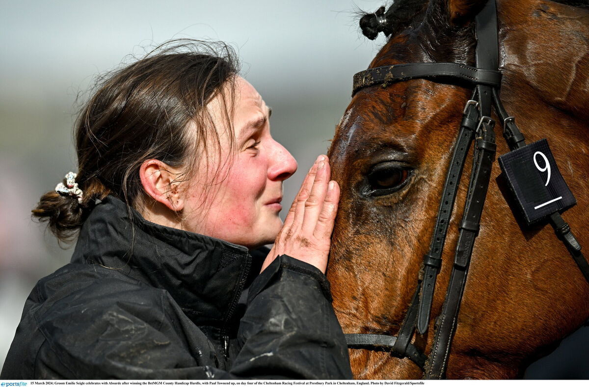 Groom Emilie Seigle celebrates with Absurde after winning the County Handicap Hurdle, with Paul Townend up. Picture: Fitzgerald/Sportsfile Groom Emilie Seigle celebrates with Absurde after winning the County Handicap Hurdle, with Paul Townend up. Picture: Fitzgerald/Sportsfile