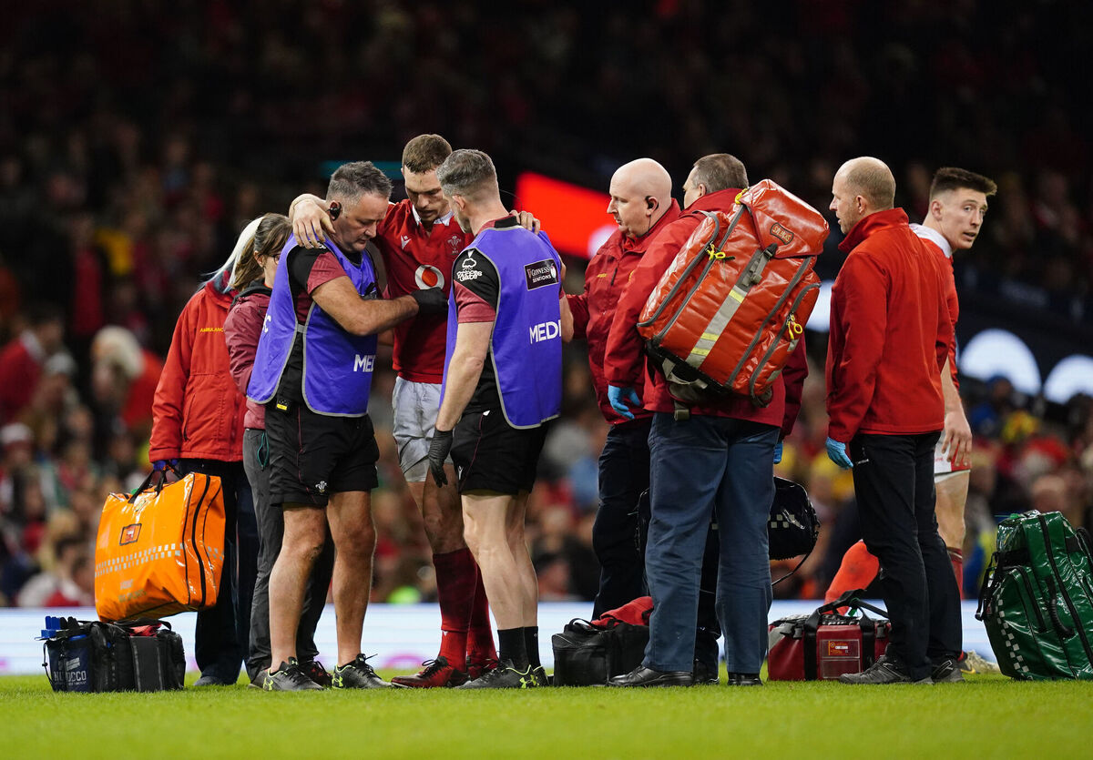 Wales' George North injured and carried off. Photo  