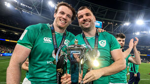 <p>Ireland’s Ryan Baird and Tadhg Beirne celebrate with the trophy. Pic: INPHO/Dan Sheridan</p>
