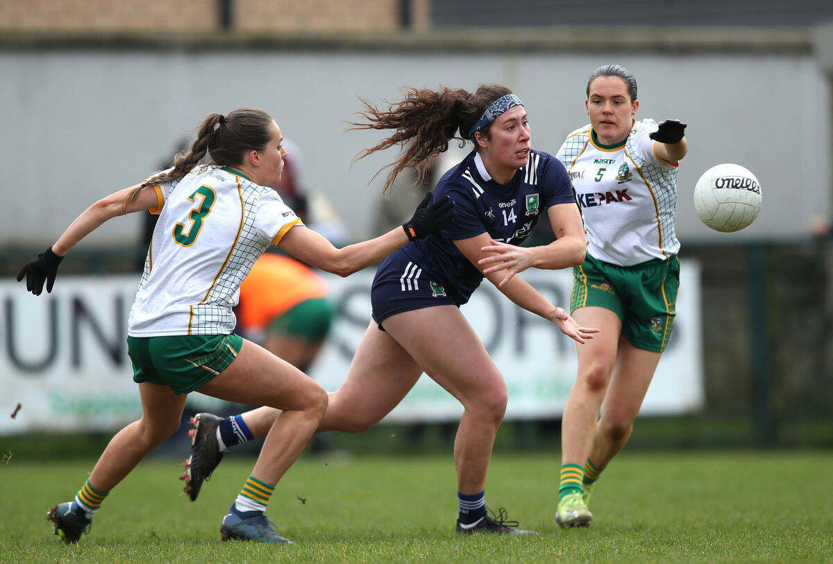 Meath's Áine Sheridan and Niamh Gallogly tackle Emma Dineen of Kerry. Picture: ©INPHO/Leah Scholes