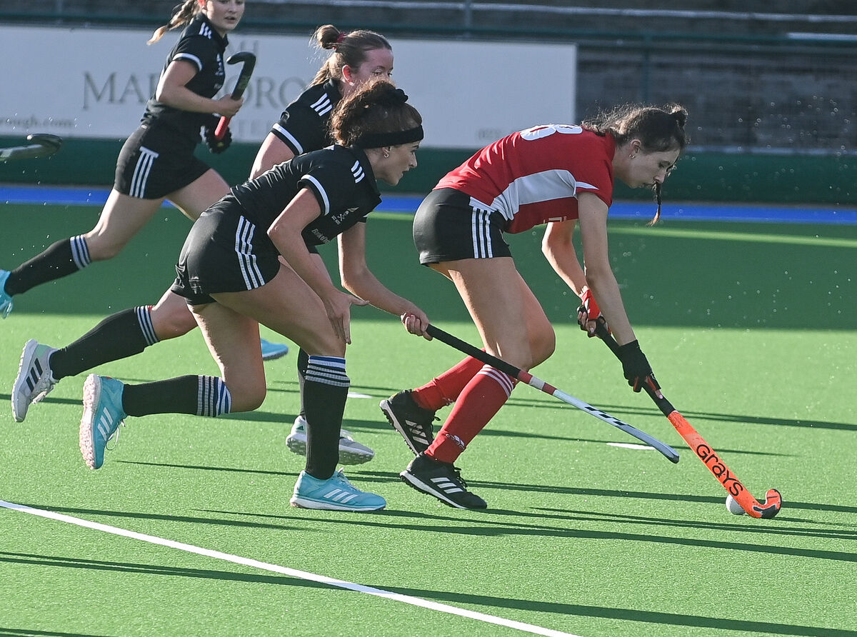  Harlequins' Beth Anne O'Farrell races past UCC's Enya O'Donoghue, during the Women's Munster Senior Hockey Cup final, at Garryduff Sports Centre, Cork Picture: David Keane.
