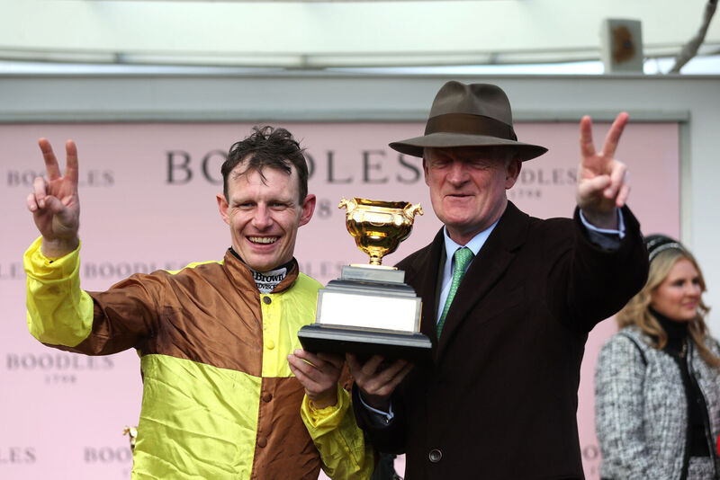 Paul Townend and trainer Willie Mullins with the Gold Cup Trophy. Picture: Steven Paston for The Jockey Club/PA Wire. Paul Townend and trainer Willie Mullins with the Gold Cup Trophy. Picture: Steven Paston for The Jockey Club/PA Wire.