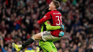 <p>Manchester United's Scott McTominay celebrates with team-mate Andre Onana. Pic: Martin Rickett/PA Wire</p>