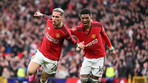<p>MANCHESTER, ENGLAND - MARCH 17: Antony of Manchester United celebrates scoring his team's second goal with teammate Amad Diallo during the Emirates FA Cup Quarter Final between Manchester United and Liverpool FC at Old Trafford on March 17, 2024 in Manchester, England. (Photo by Michael Regan/Getty Images)</p>