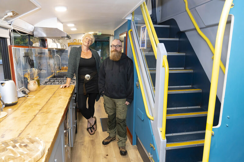 Ellie O'Byrne and Mark Graham with their Eco Bus. Photograph: Patrick Browne
