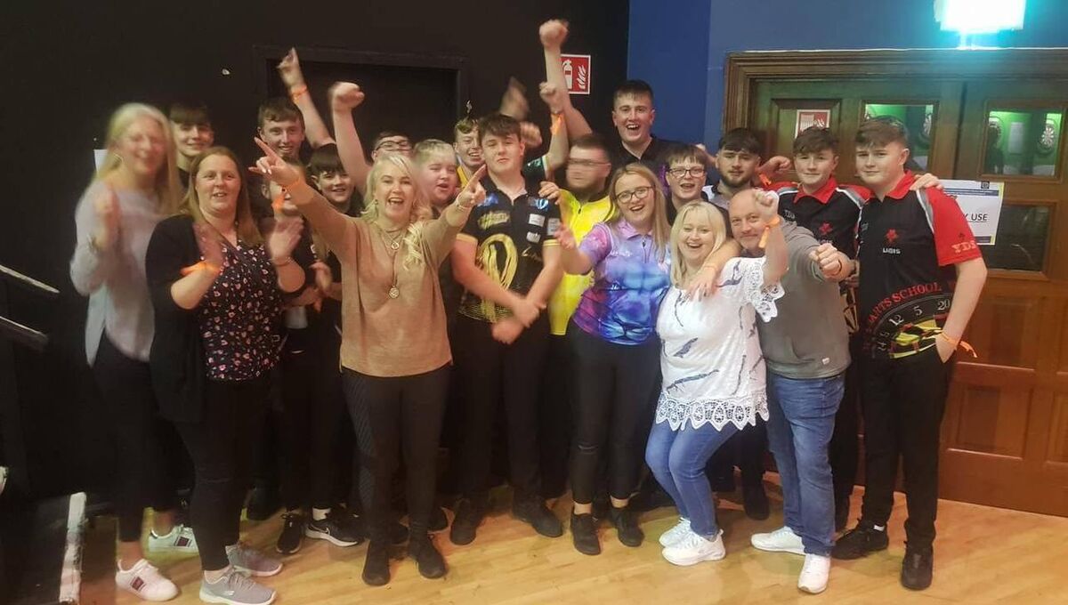 Adam Dee's family and friends celebrate his victory over Luke Littler. Adam Dee's family and friends celebrate his victory over Luke Littler.