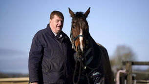 <p>Trainer John "Shark" Hanlon with horse Hewick. . Pic: Niall Carson/PA Wire.</p>