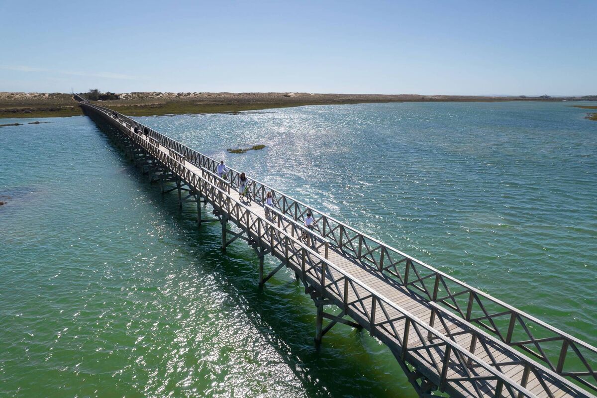 The longest wooden bridge in Europe in the Ria Formosa linking Quinta da Lago with Praia Gigi The longest wooden bridge in Europe in the Ria Formosa linking Quinta da Lago with Praia Gigi