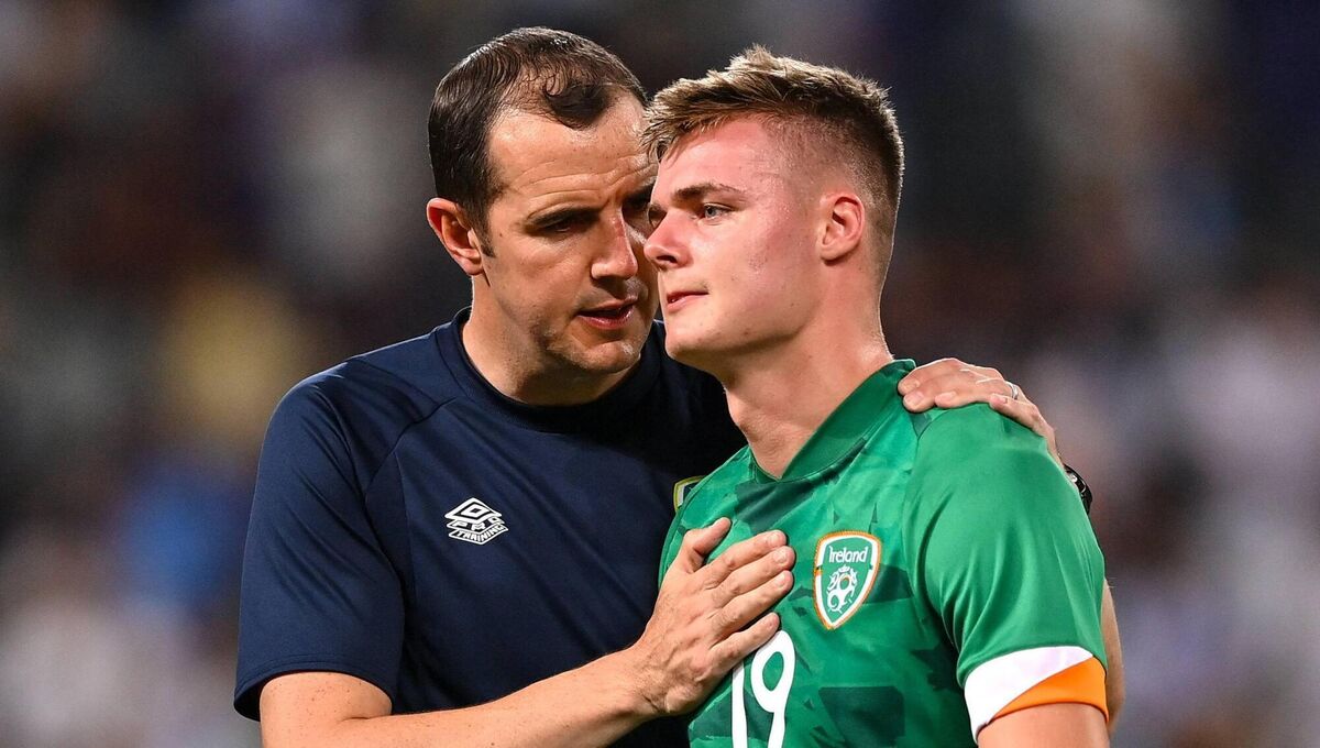 Evan Ferguson of Ireland is consoled by assistant manager John O'Shea after the UEFA European U21 Championship play-off second leg match against Israel. Picture: Seb Daly/Sportsfile Evan Ferguson of Ireland is consoled by assistant manager John O'Shea after the UEFA European U21 Championship play-off second leg match against Israel. Picture: Seb Daly/Sportsfile