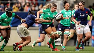 <p>FULL THROTTLE: Ireland’s Dorothy Wall tries to break past the tackle of France’s Assia Khalfaoui in their Six Nations opener at Stade Marie-Marvingt, Le Mans, on Saturday. Picture: Ben Brady/Inpho</p>