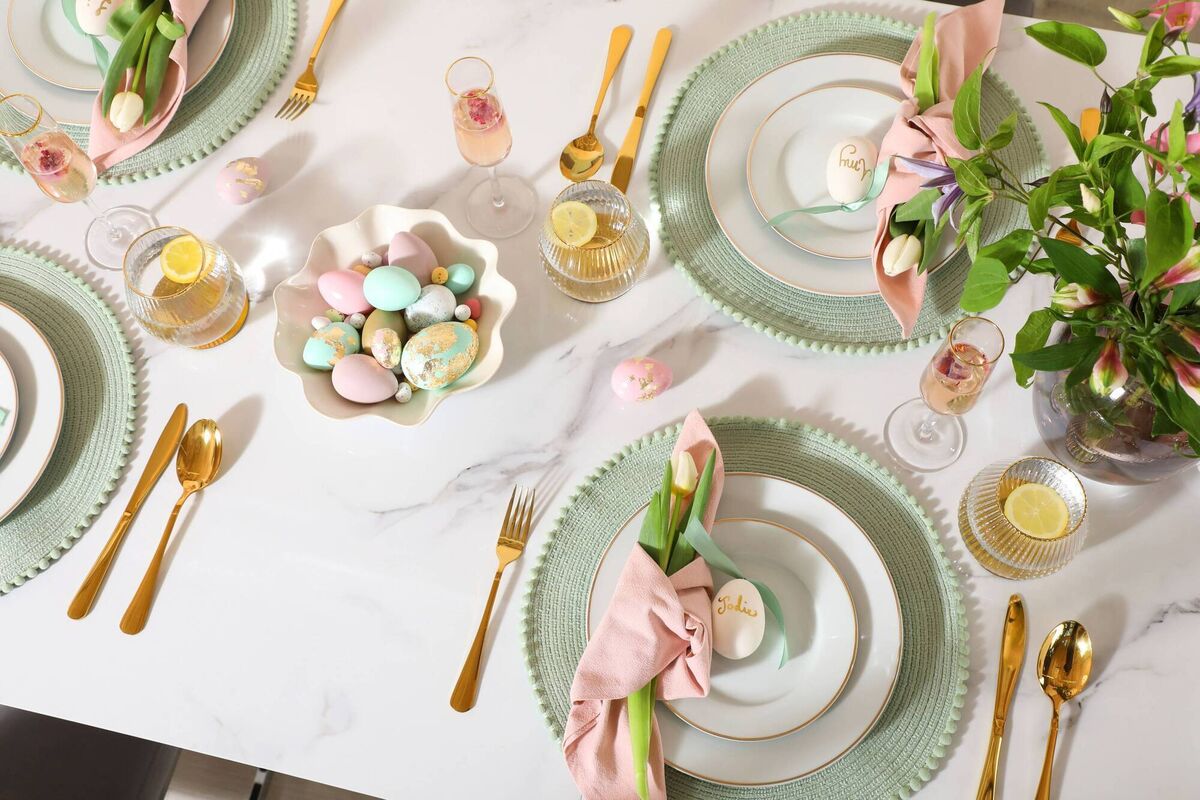 Fresh green tableware with pink napery is a fresh look for Easter and spring, with the colour duo harking back to the 1980s for nostalgia. Picture: Furniture and Choice 