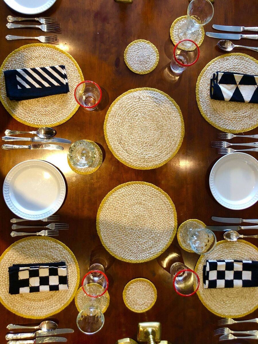 Rattan gives texture to a more minimal, tablecloth-free tablescape Picture: The Braided Rug Company 