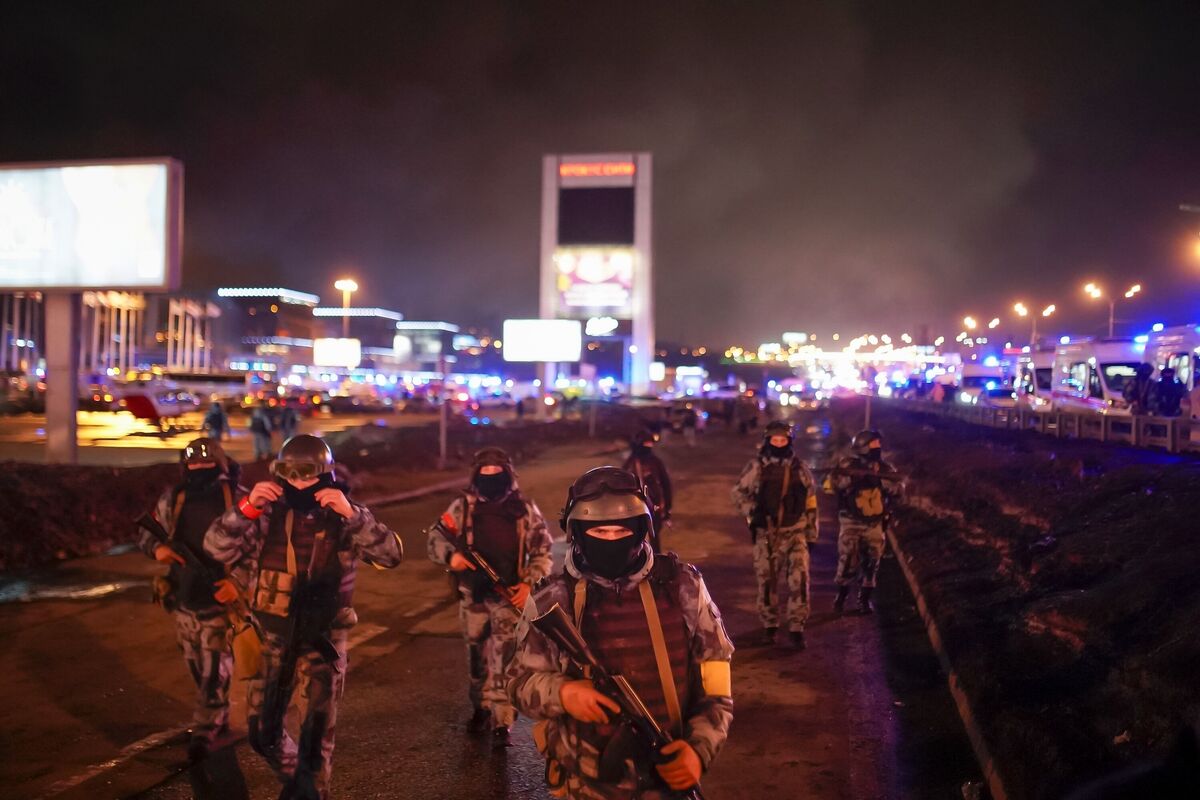 Russian Rosguardia (National Guard) servicemen secure an area at the Crocus City Hall on the western edge of Moscow, Russia, on Saturday. Picture: Alexander Avilov/Moscow News Agency via AP Russian Rosguardia (National Guard) servicemen secure an area at the Crocus City Hall on the western edge of Moscow, Russia, on Saturday. Picture: Alexander Avilov/Moscow News Agency via AP