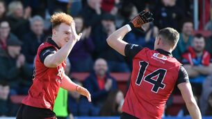 <p>DOWN TOWN: Danny Magill of Down celebrates with Pat Havern after he scored a goal. Pic Credit: Andrew Paton, Inpho.</p>