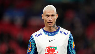 <p>Brazil's Richarlison warms up ahead of the international friendly match at Wembley. Photo credit: Mike Egerton/PA Wire.</p>