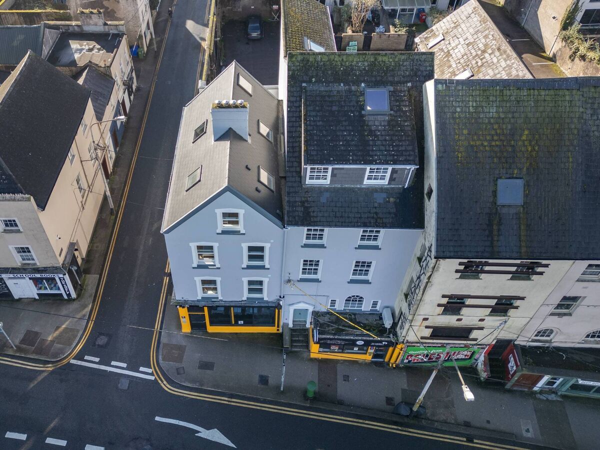 The buildings are at the junction of Dunbar Street and George's Quay The buildings are at the junction of Dunbar Street and George's Quay